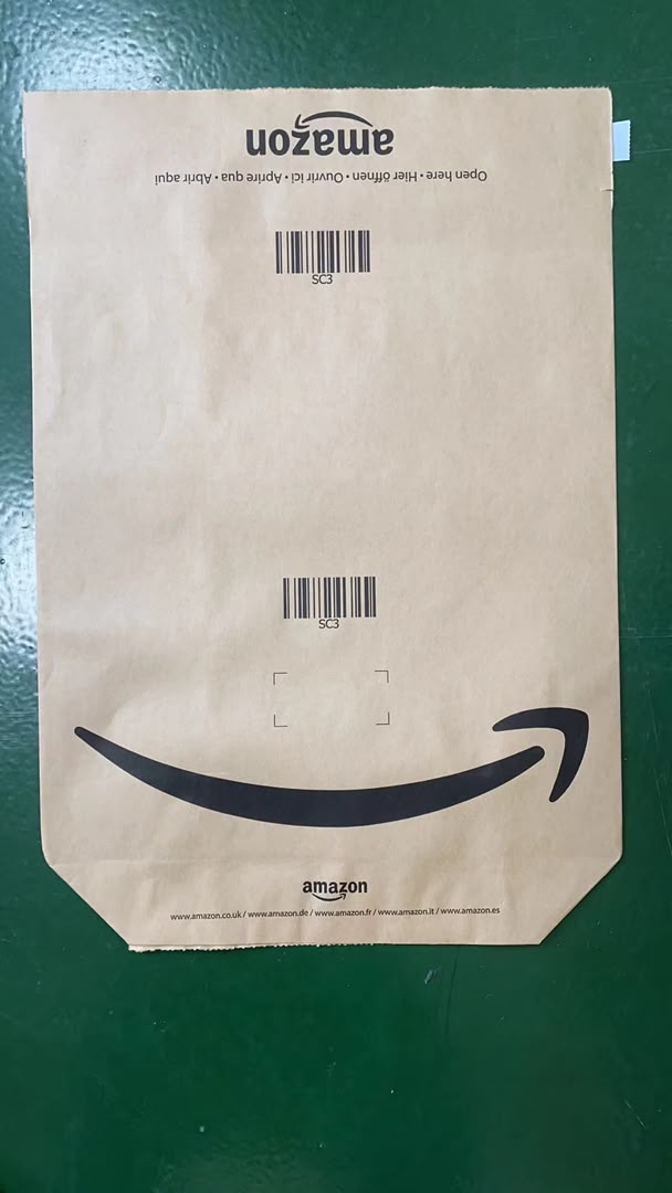 Front of Amazon kraft paper mailer with the smile logo and the list of European Amazon storefronts